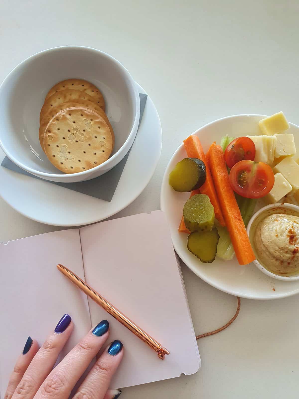 Airline lounge food with notebook