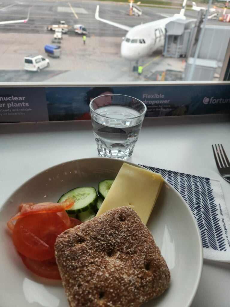 Finnair Business Lounge (non-schengen) Helsinki Food and Nutrition Review (updated 2024) - finnair business lounge Finnair Lounge Schengen view with sandwich