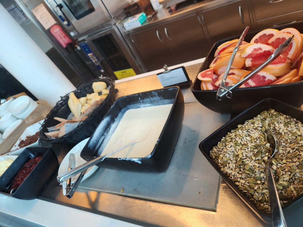 Finnair Lounge Schengen (breakfast), Helsinki Food and Nutrition Review - Finnair Lounge Schengen yogurt and pumpkin seeds Finnair Lounge Schengen