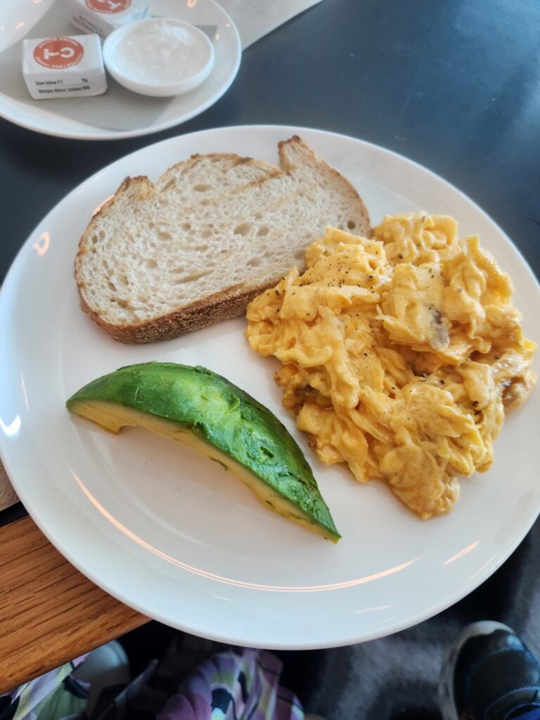 Qantas International First Lounge Melbourne (breakfast) Food and Nutrition Review (updated 2025) - Qantas International First Lounge Melbourne Scrambled eggs with an added side of avocado