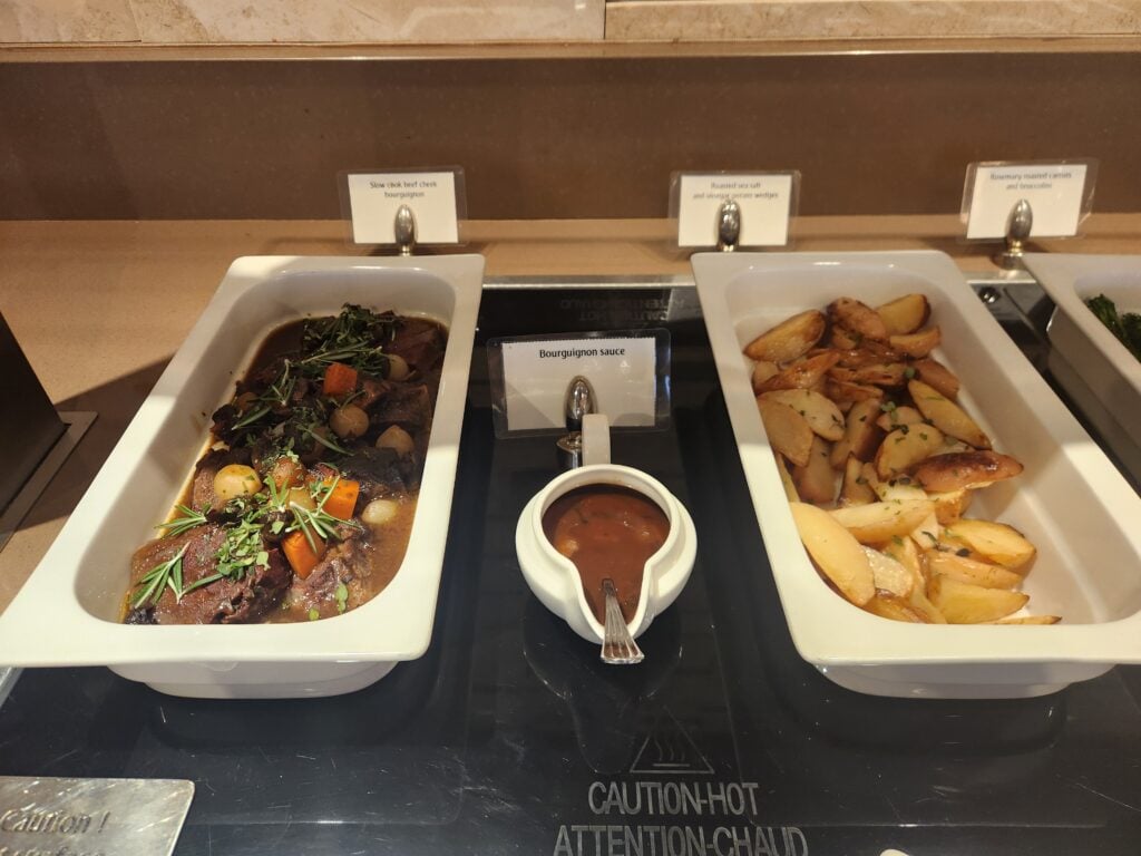 Is Emirates, Qatar or Qantas the best lounge for food in T1 Changi Airport, Singapore? - best lounge for food in T1 Changi Beef cheek and roast potatoes Emirates Lounge Singapore what is best lounge for food in T1 Changi