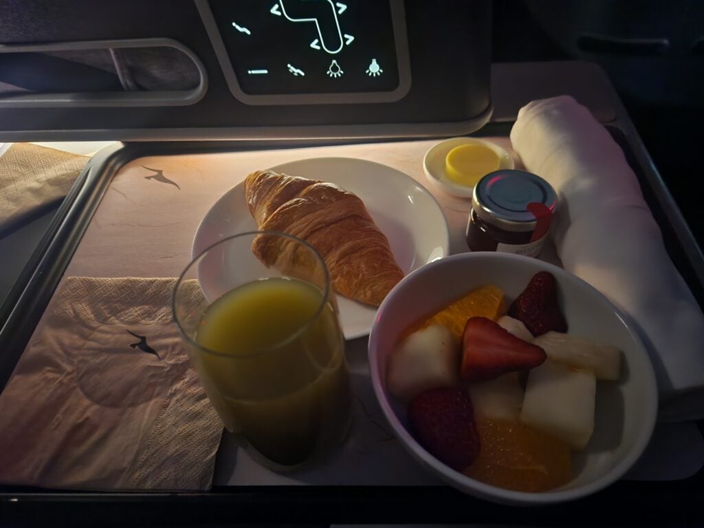 Qantas Business Class Food Review - Singapore to Brisbane - Qantas Business Class Food Singapore to Brisbane Fruit salad, bakery and green juice Qantas Business Class Food