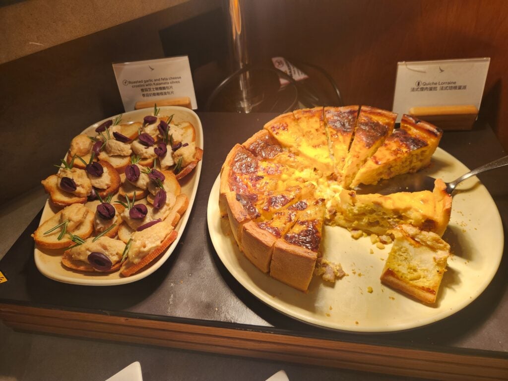 Cathay Pacific The Pier First Lounge Food and Nutrition Review - Hong Kong - The Pier First Lounge food Feta and olive crostinis and Quiche Lorraine The Pier First Lounge Hong Kong