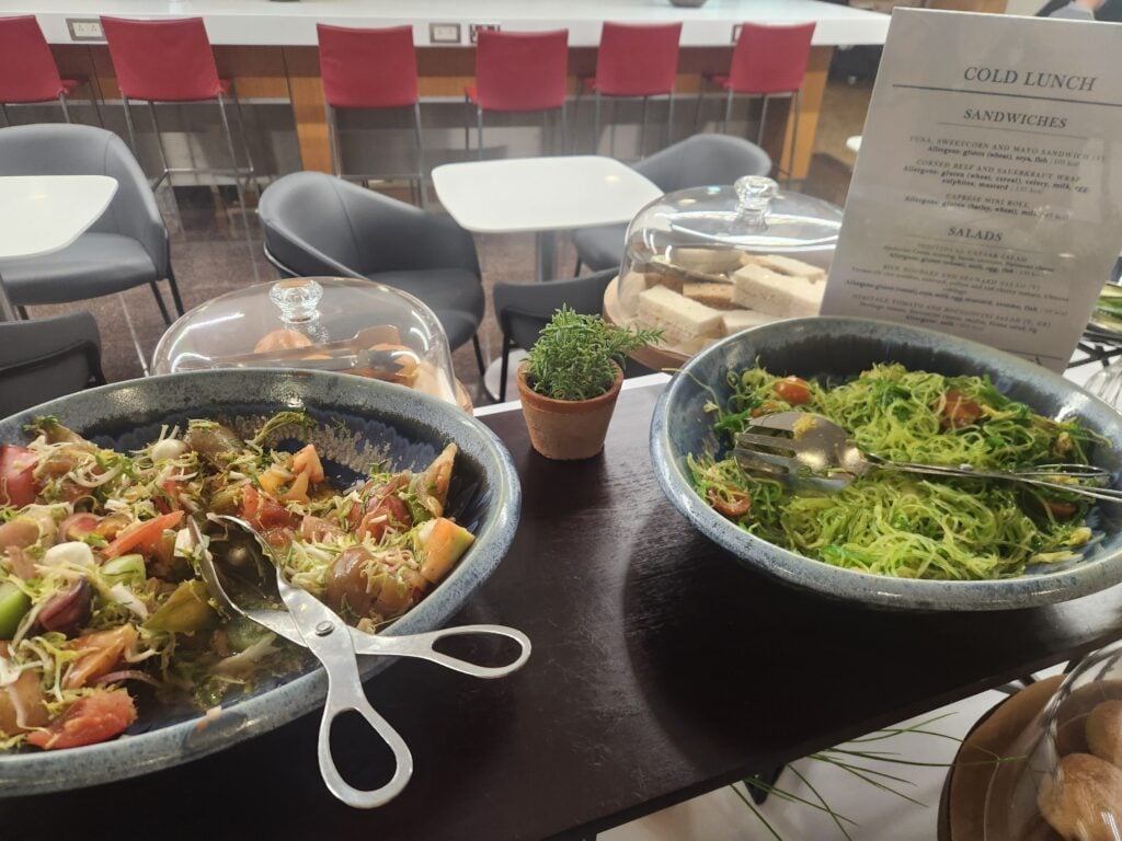American Airlines First Lounge Food and Nutrition Review - London Heathrow (T3) - American Airlines First Lounge London food Tomato and bocconcini salad and rice noodle and seaweed salad American Airlines First Lounge London food