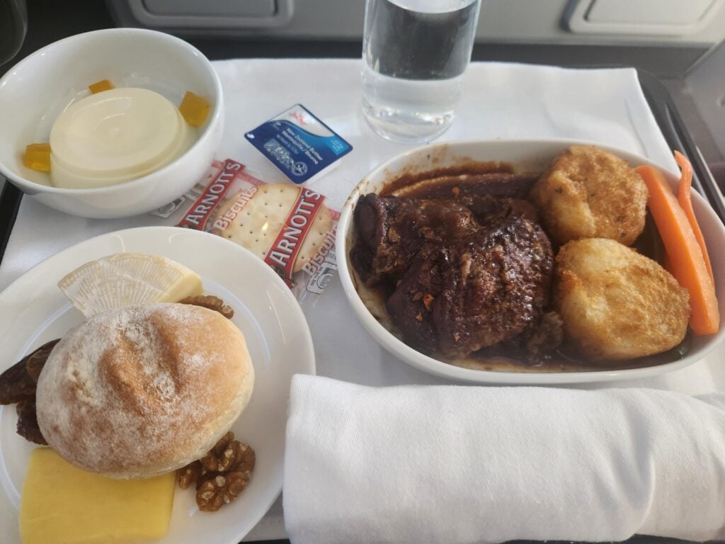 Chicken with soy sauce Qantas business class food flying Fiji to Sydney.
